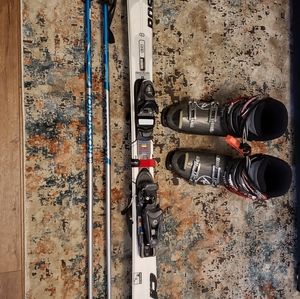 Rossignol skis with bidings, boots, and poles